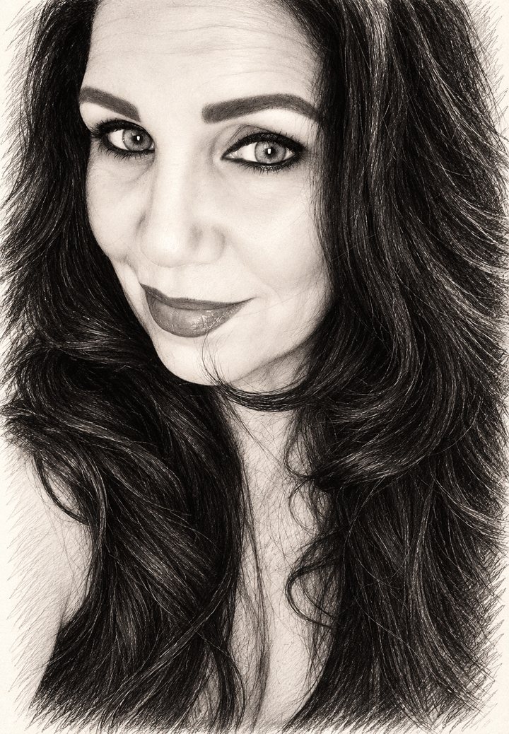 Sepia pencil-style portrait of a woman with long dark wavy hair looking toward the viewer